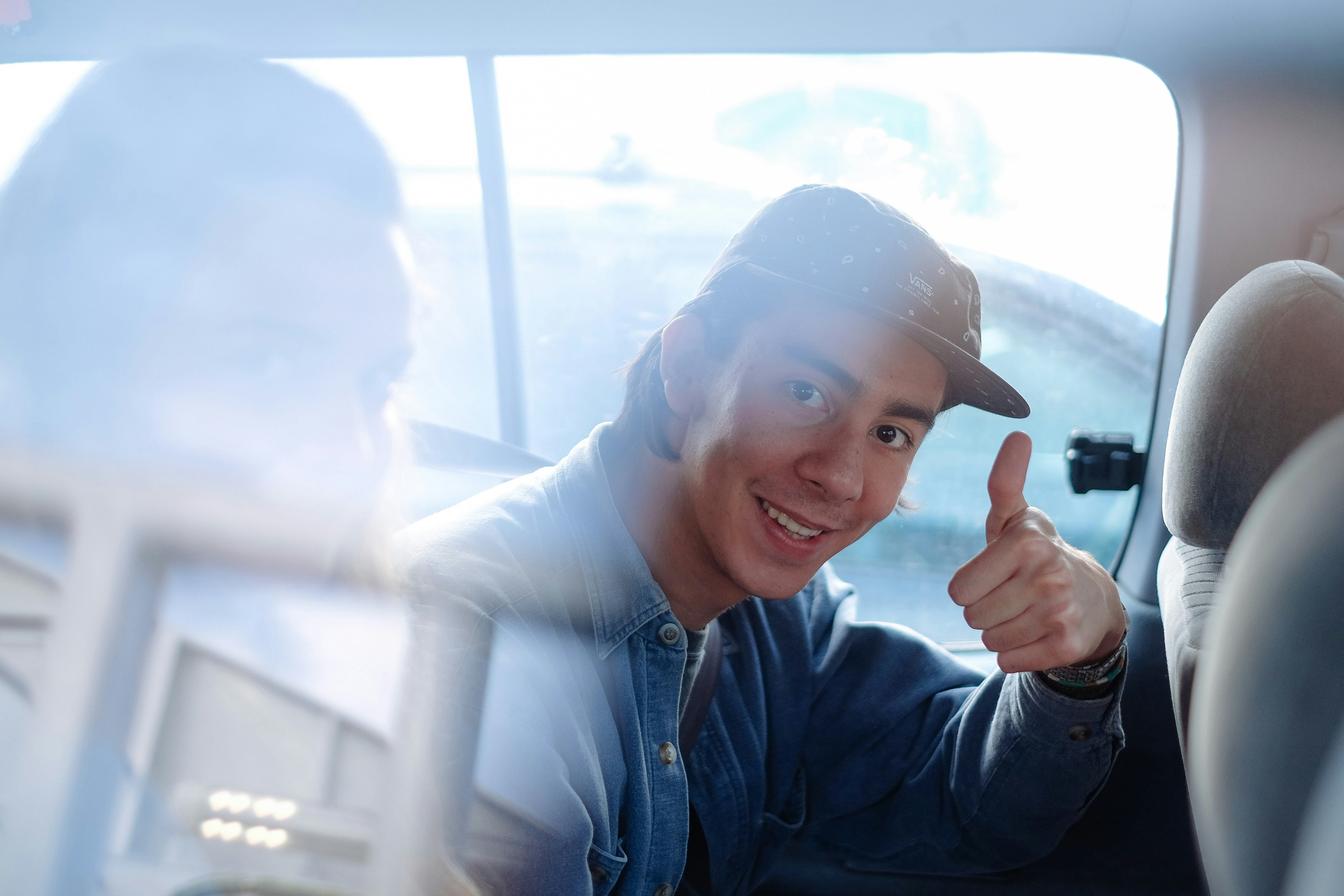 Happy professional driver giving thumbs up